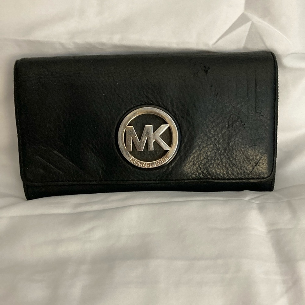 Michael Kors Wallet. Used with care. 8” Long x 5” Wide. Black.